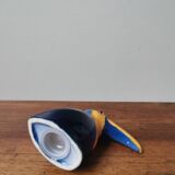 Vintage salt shaker in the shape of a toucan bird slip