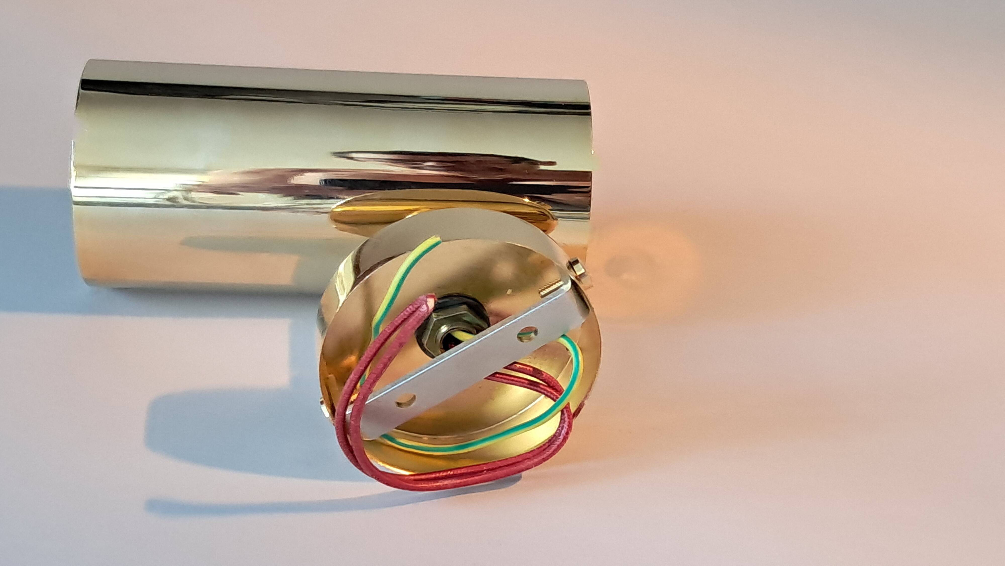 Modernist wall lamp in gilded brass, Italy 1970/1980.