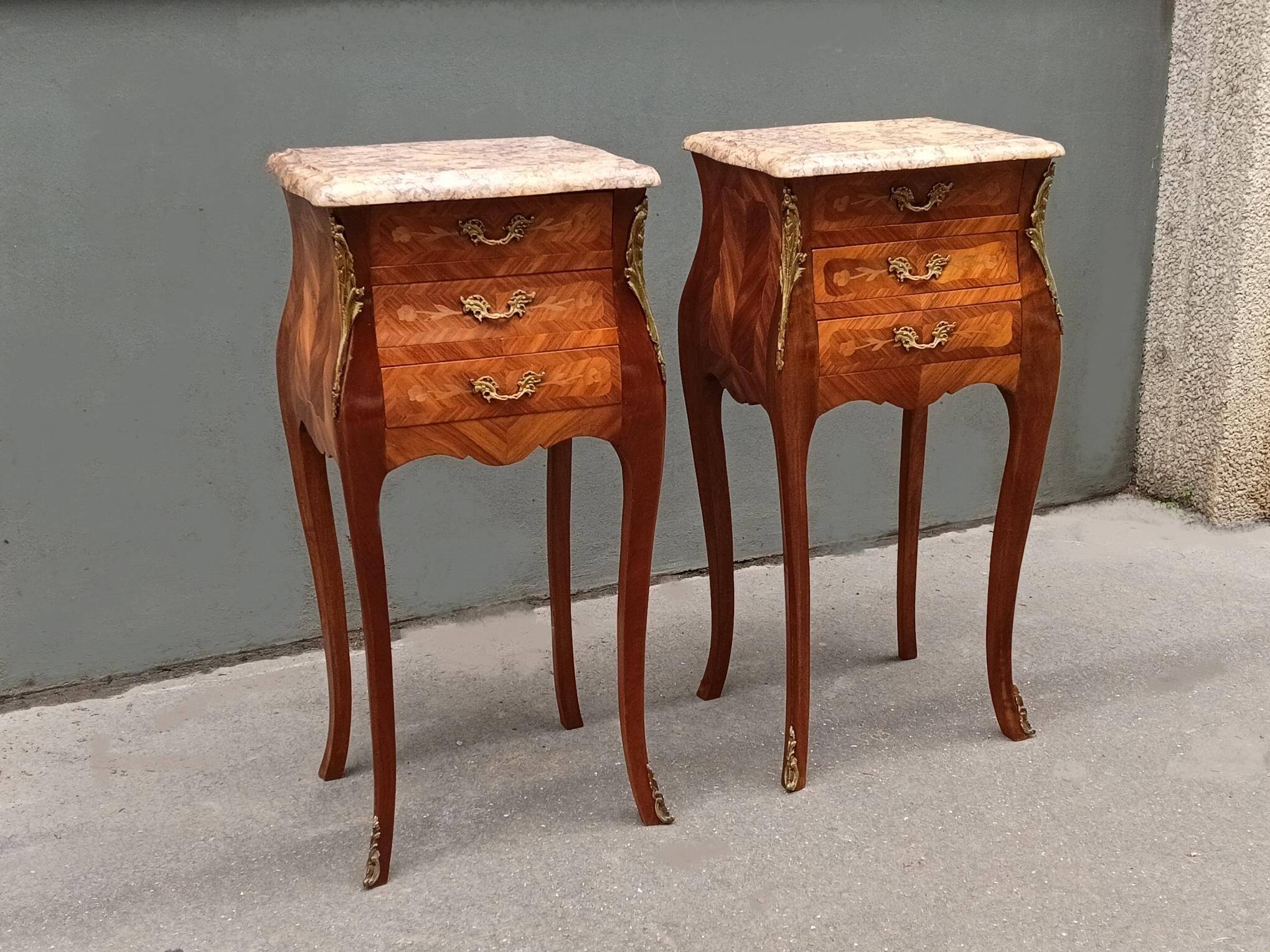 Pair of Louis XV style bedside tables in rosewood.