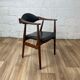 Vintage Scandinavian armchair in teak and black skai, 60s