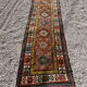 Long antique Persian carpet