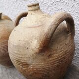 Old terracotta pot with two handles