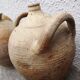 Old terracotta pot with two handles