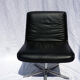Leather chair on central foot