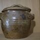 Sandstone pot with handles hands