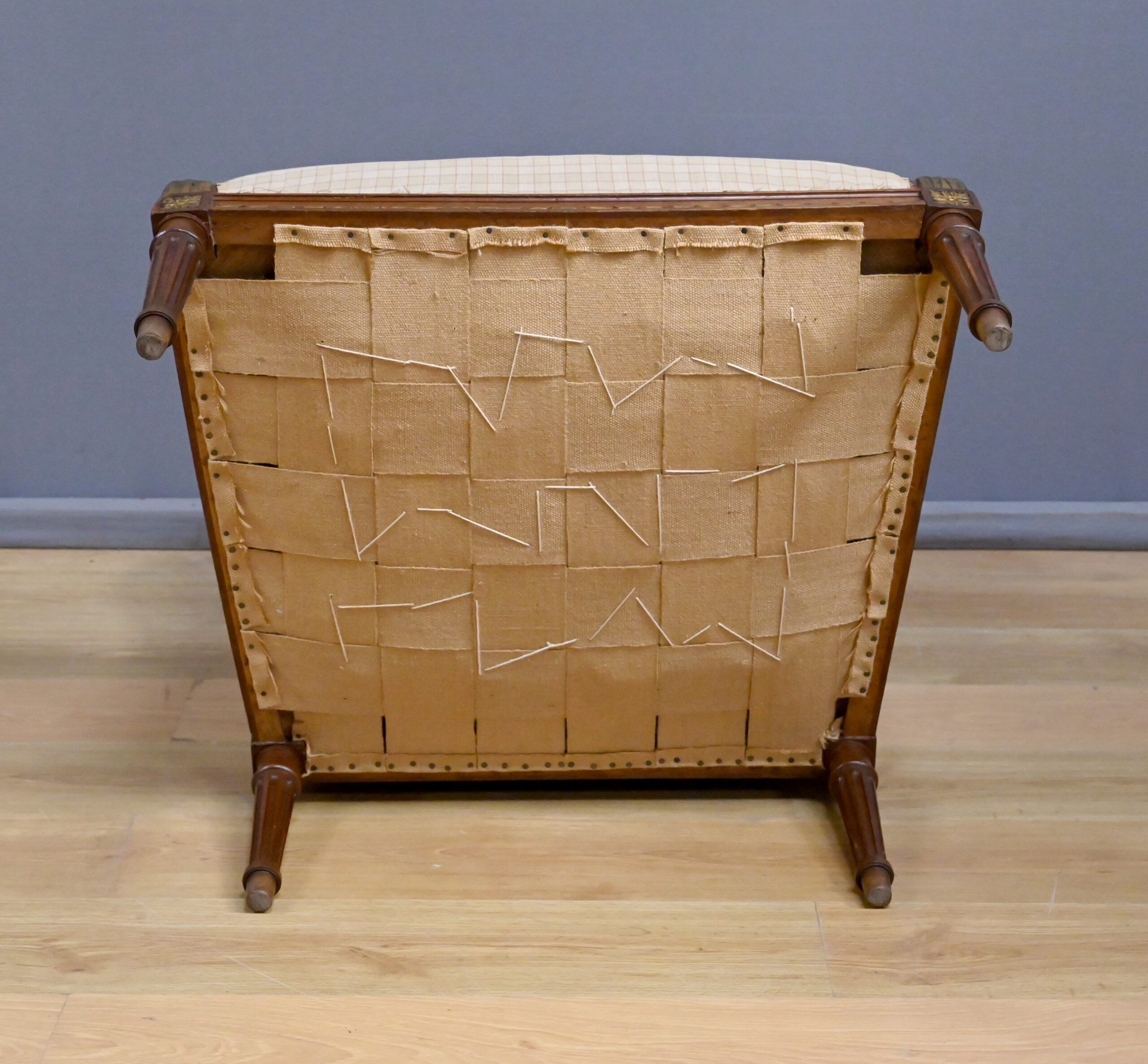 Wingback armchair in walnut, Louis XVI style – late 19th century