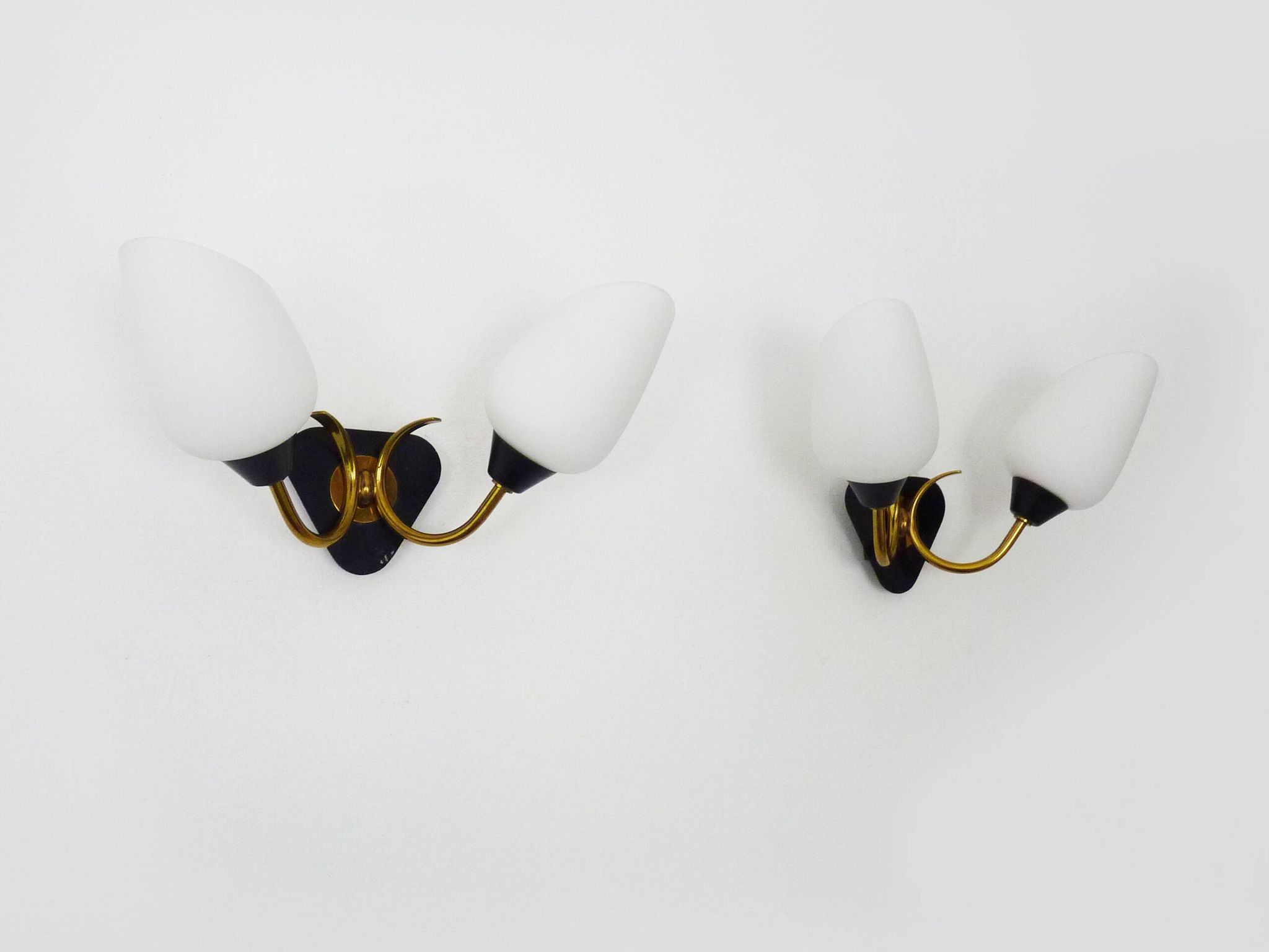 Pair of vintage Maison Arlus wall lights from the 50s in brass, opaline globe.