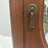 Wall cabinet with oval wall and drawer