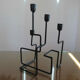 Modernist candle holder in black lacquered metal 1990