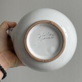 Hand decorated ceramic pitcher
