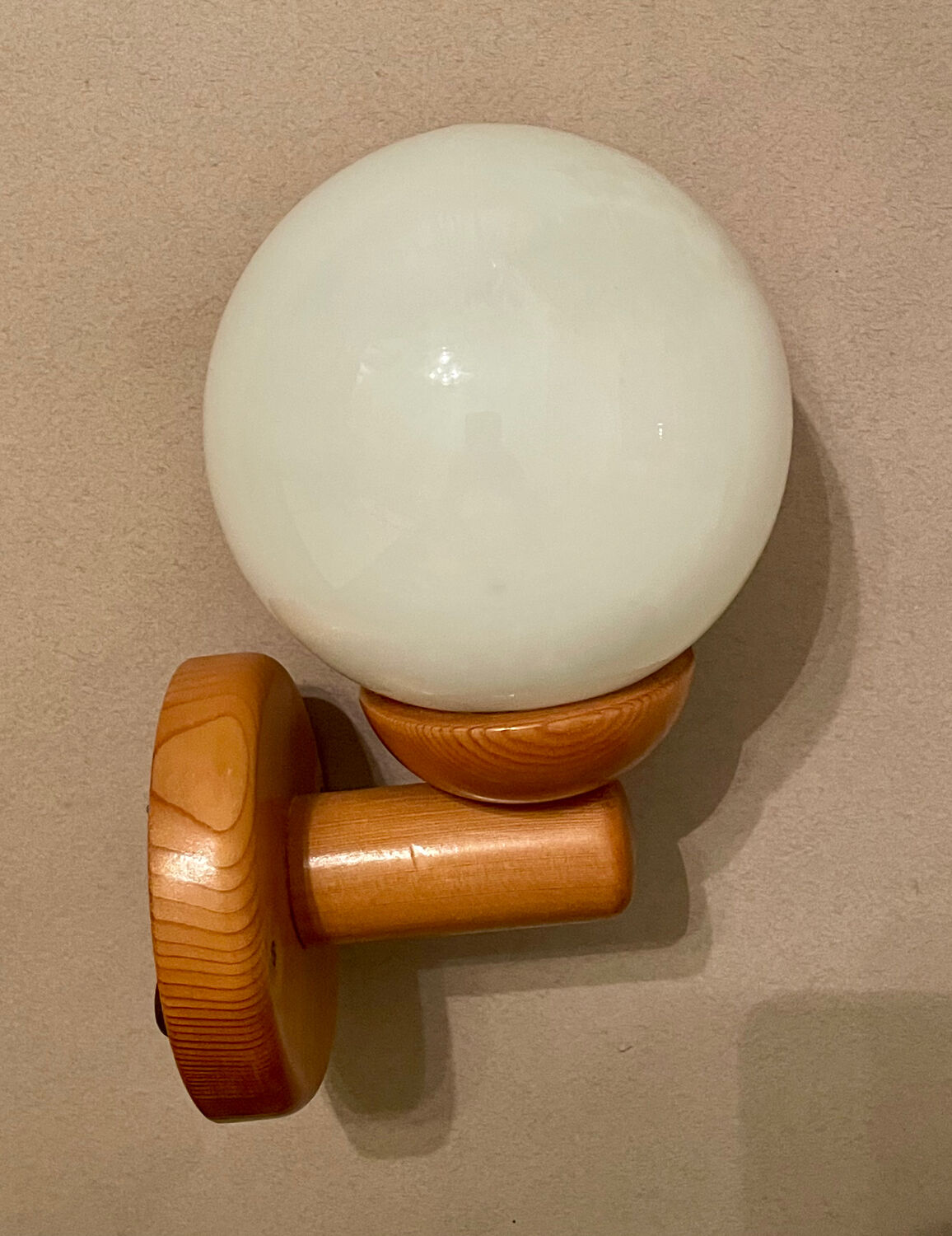 Vintage white glass wall light and pin.