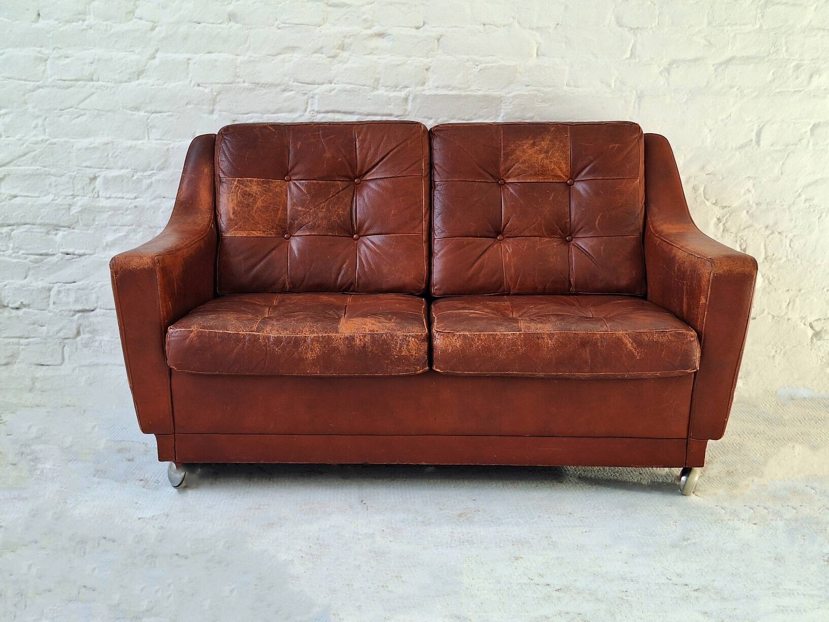 Mid century patchwork tufted patinated leather sofa, 1960s