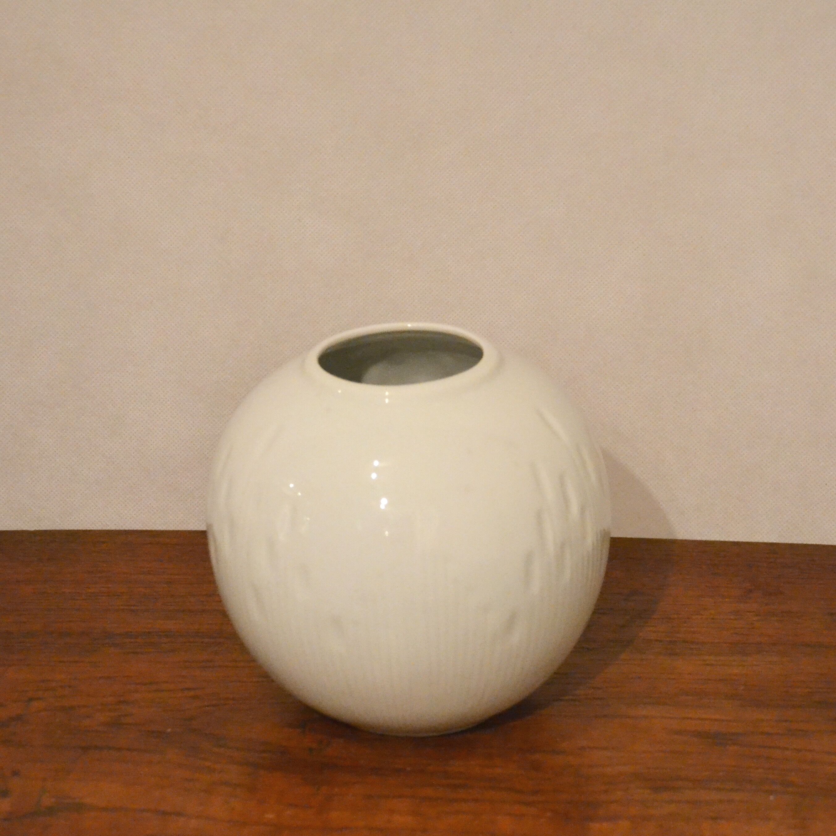 Trio of vases in white porcelain