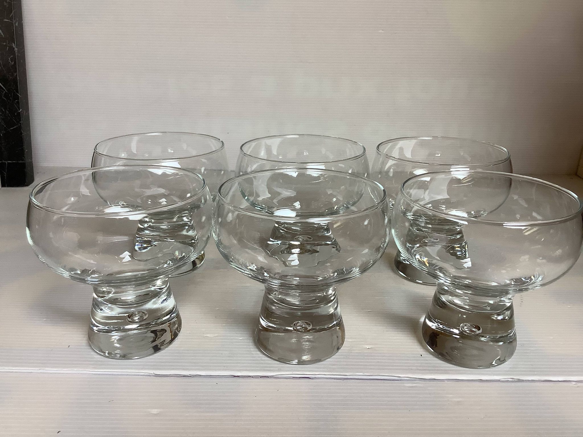 6 large bubble coupe glasses with a foot in the Kosta Boda style.