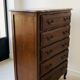 Authentic brown chest of drawers.