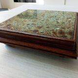 Old wood and ceramic trivet