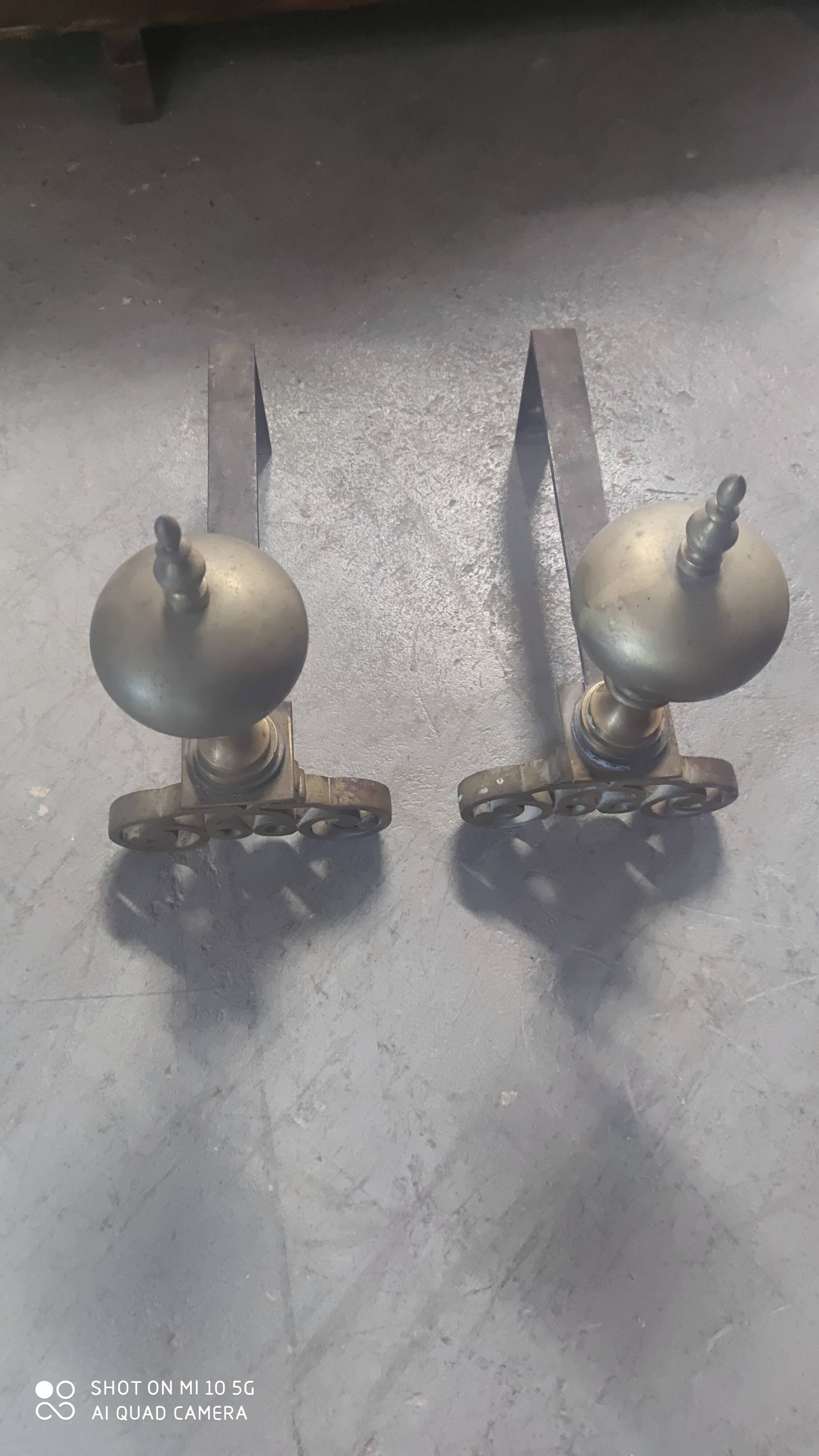 Pair of bronze and steel andirons, 19th century, Holland