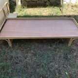 Rattan bed with integrated bedside