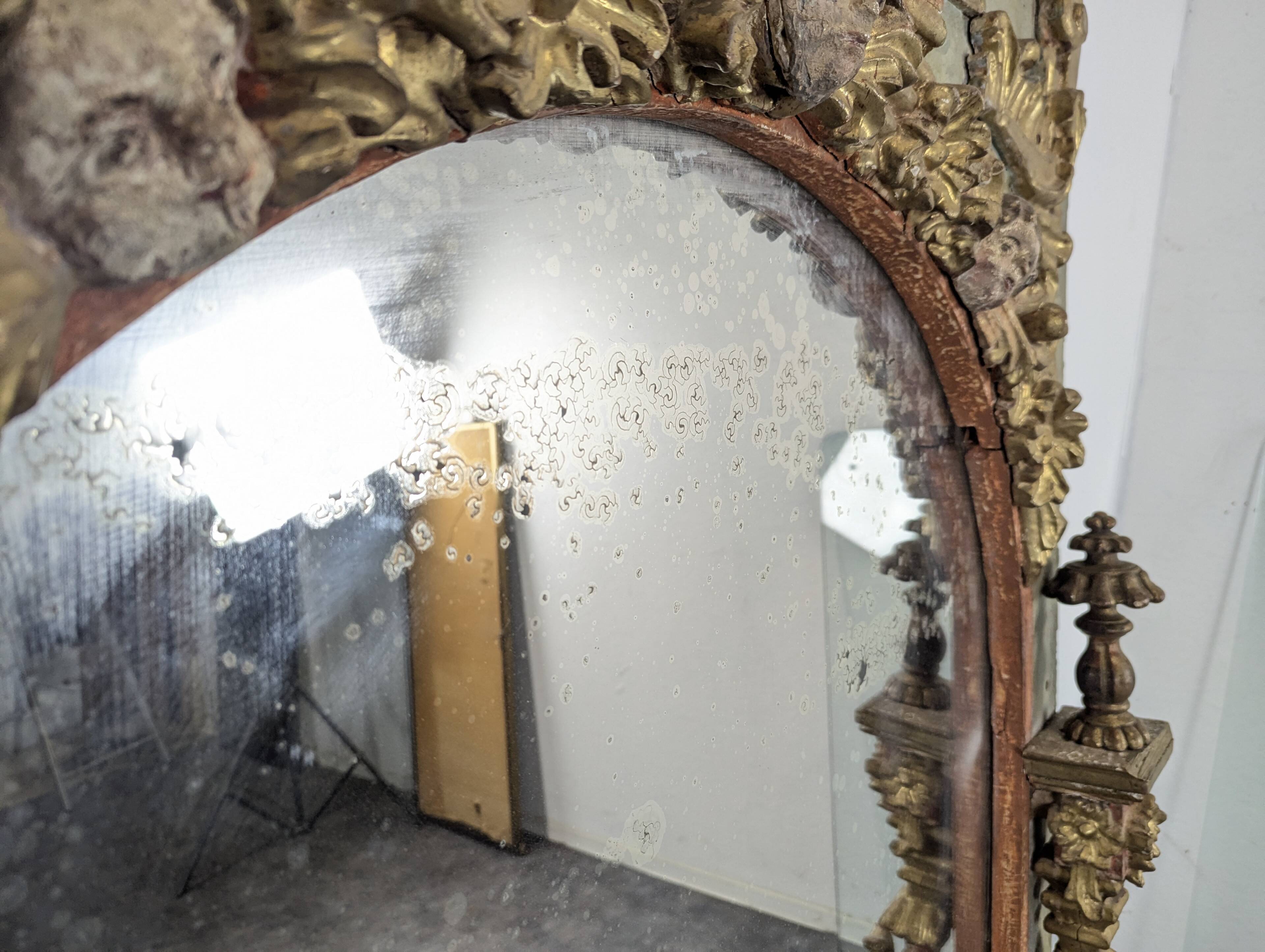 Large trumeau altarpiece composition of woodwork from the 18th century.