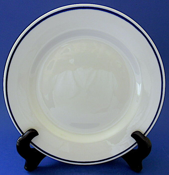 Suite of twelve (12) hotel-grade porcelain table plates