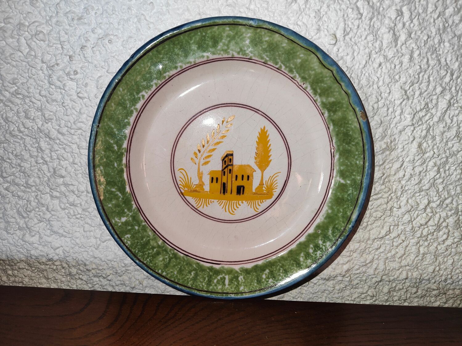 Nevers earthenware plate? XIXth Century with palace decoration