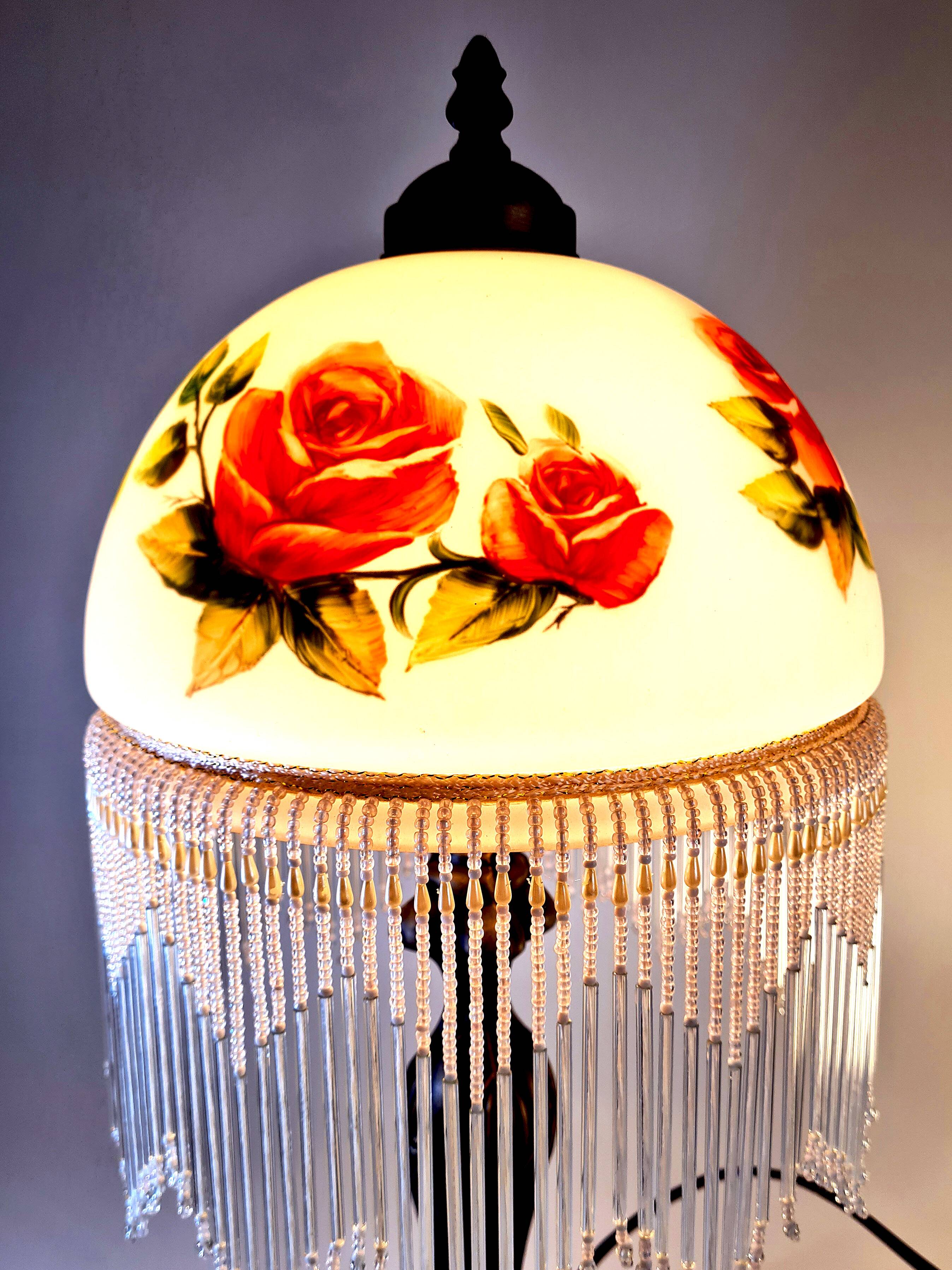Vintage Tiffany-style fringed lamp with floral globe