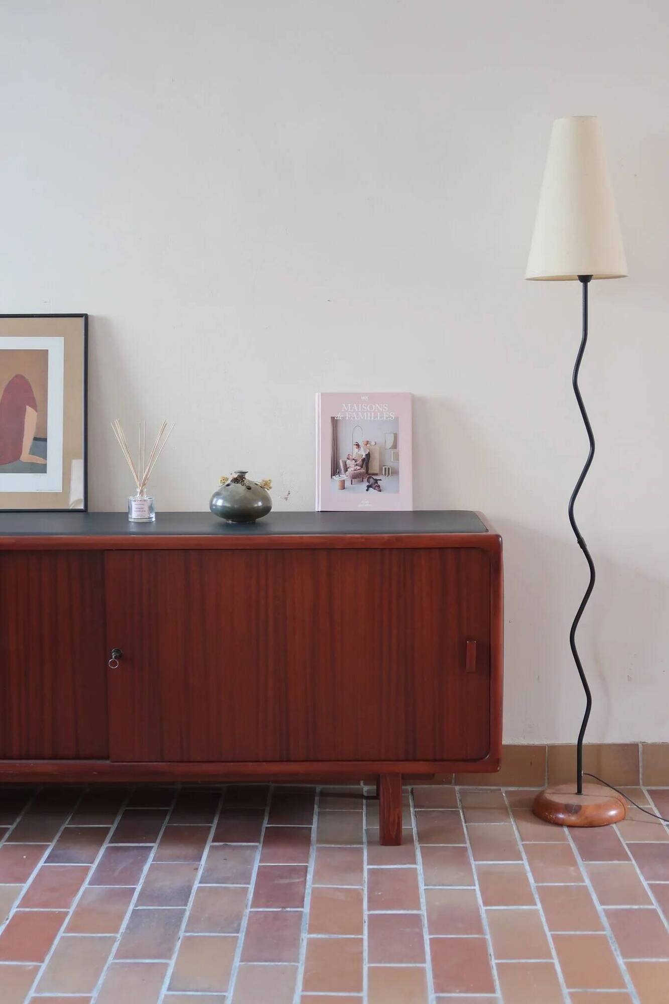 Teak enfilade, sliding doors, black faux leather top, 1970s.