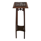High plant stand in carved wood and Art Nouveau marble.
