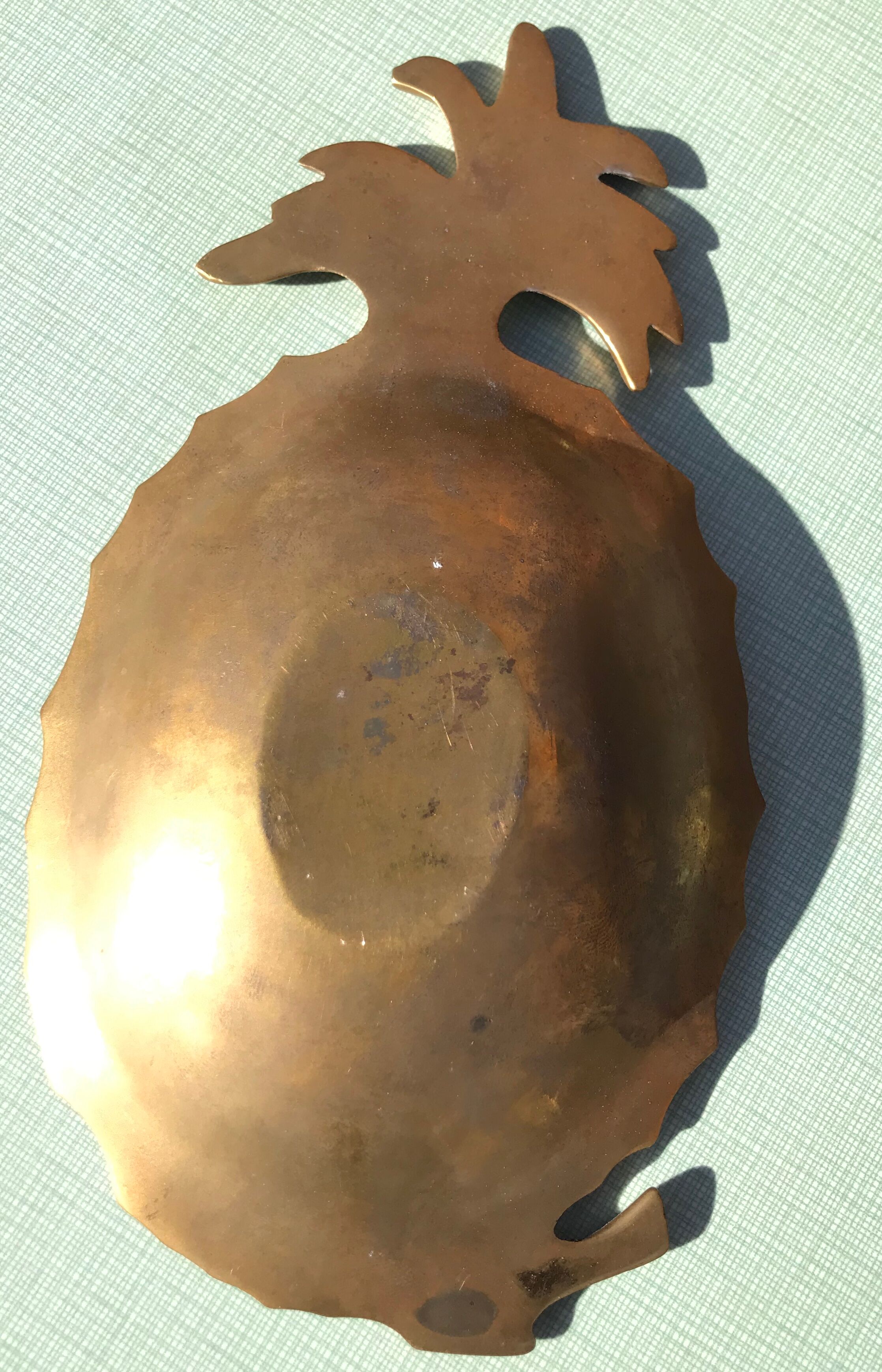 Empty brass pineapple pocket