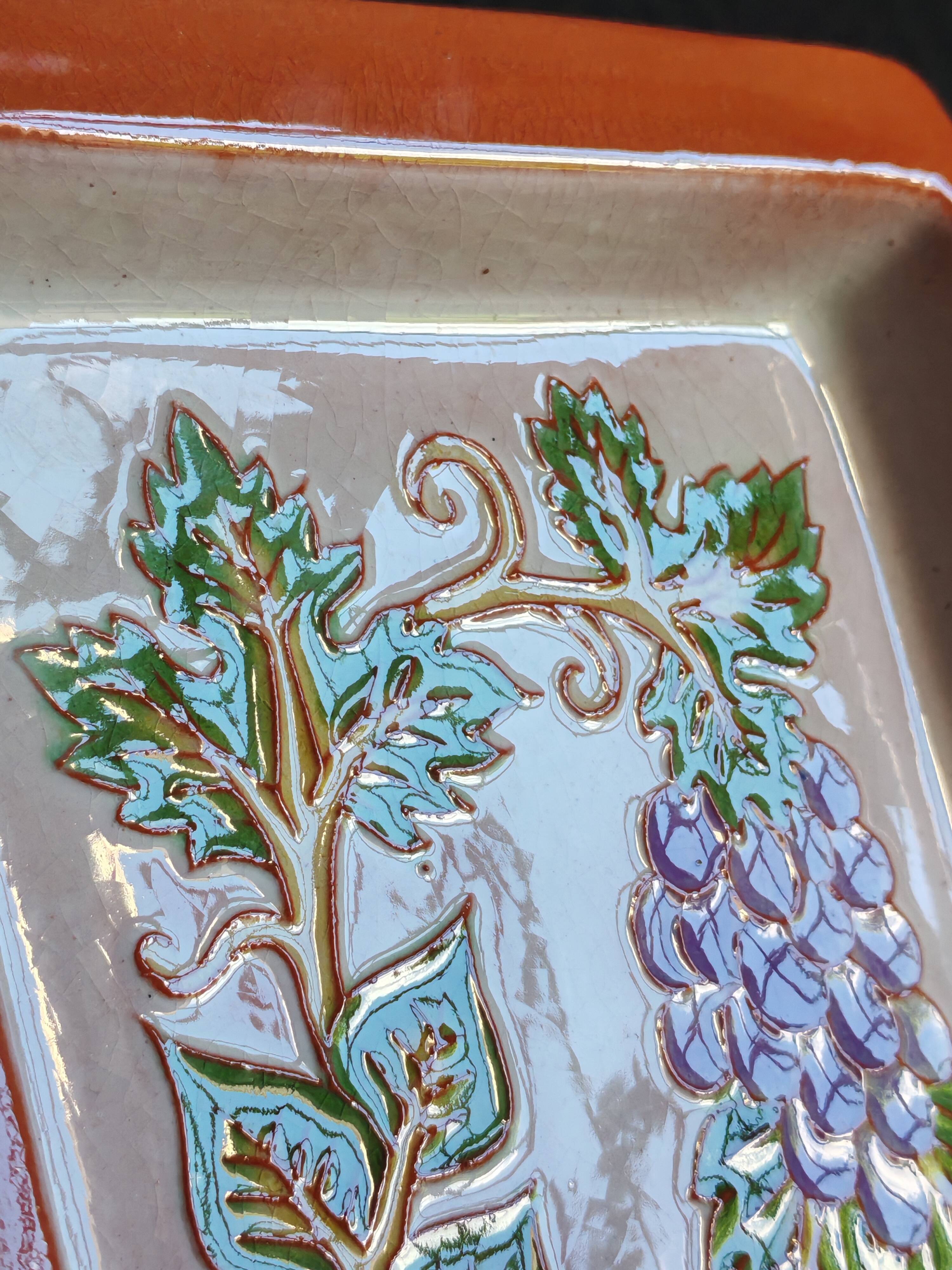 Terracotta plate signed P.Boy, glazed artisanal ceramics.