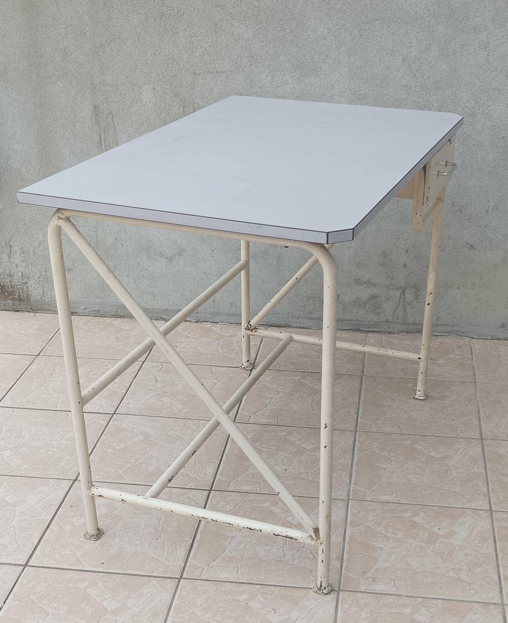 Industrial high table made of metal and formica.