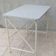 Industrial high table made of metal and formica.