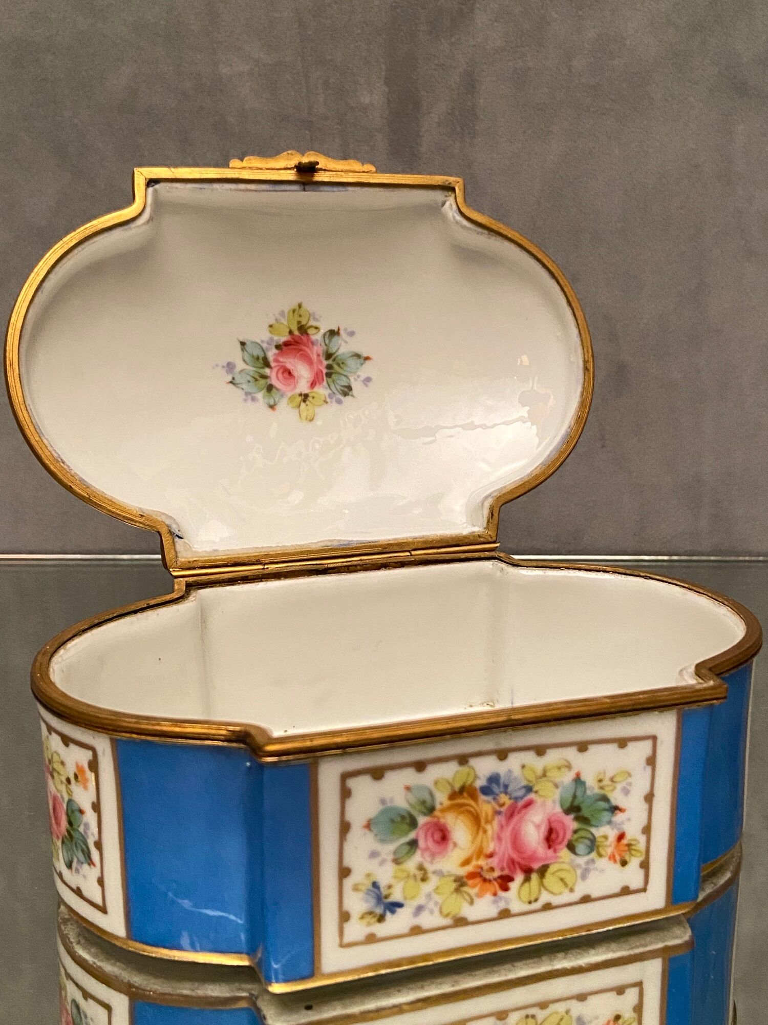 Domed porcelain box polychrome floral decoration on blue background brand Sèvres