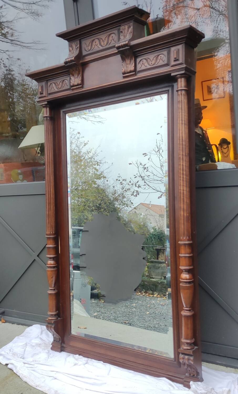 Old large carved wooden mirror