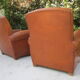 Paire de fauteuils club en cuir
