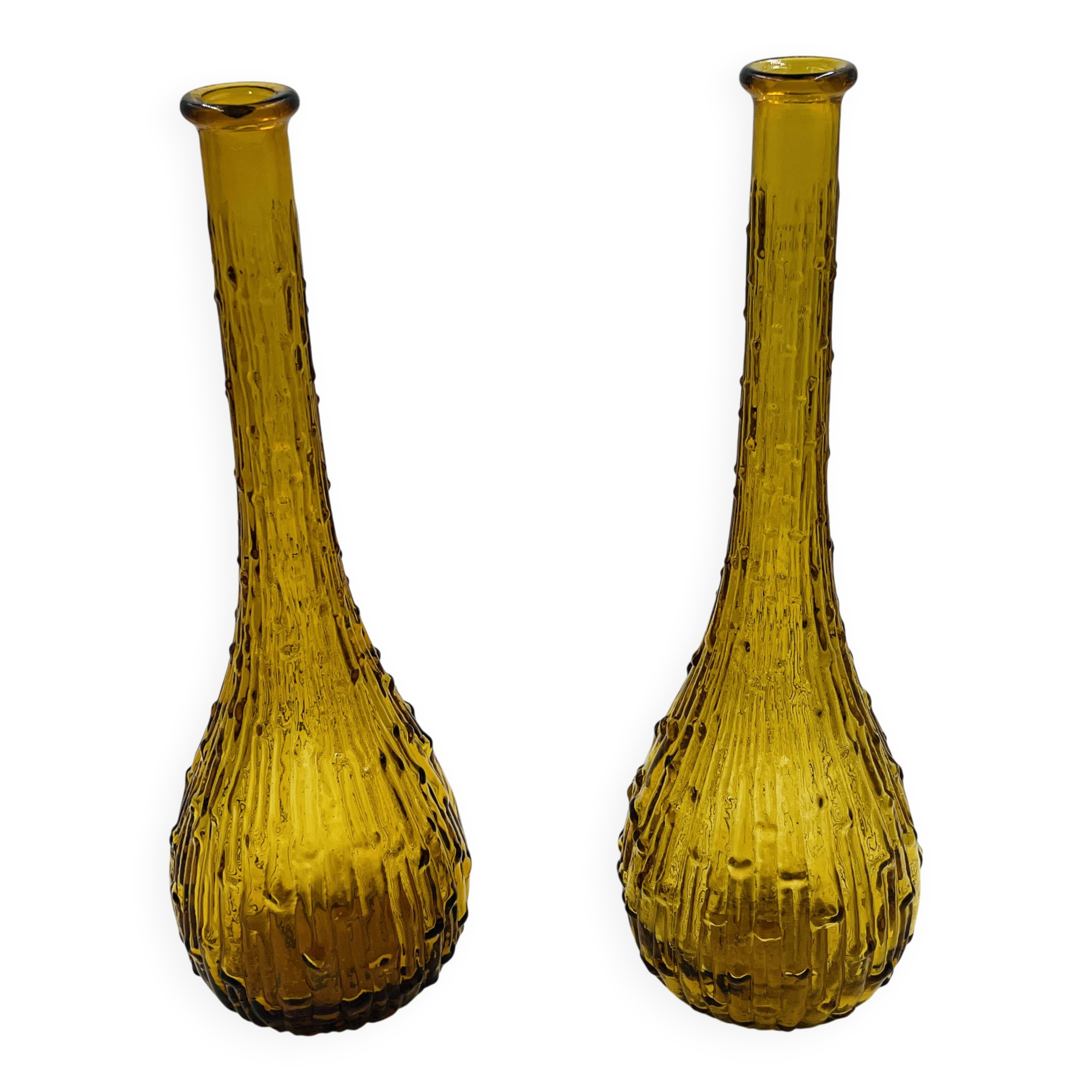 Set of two vintage textured amber glass Empoli bottles.