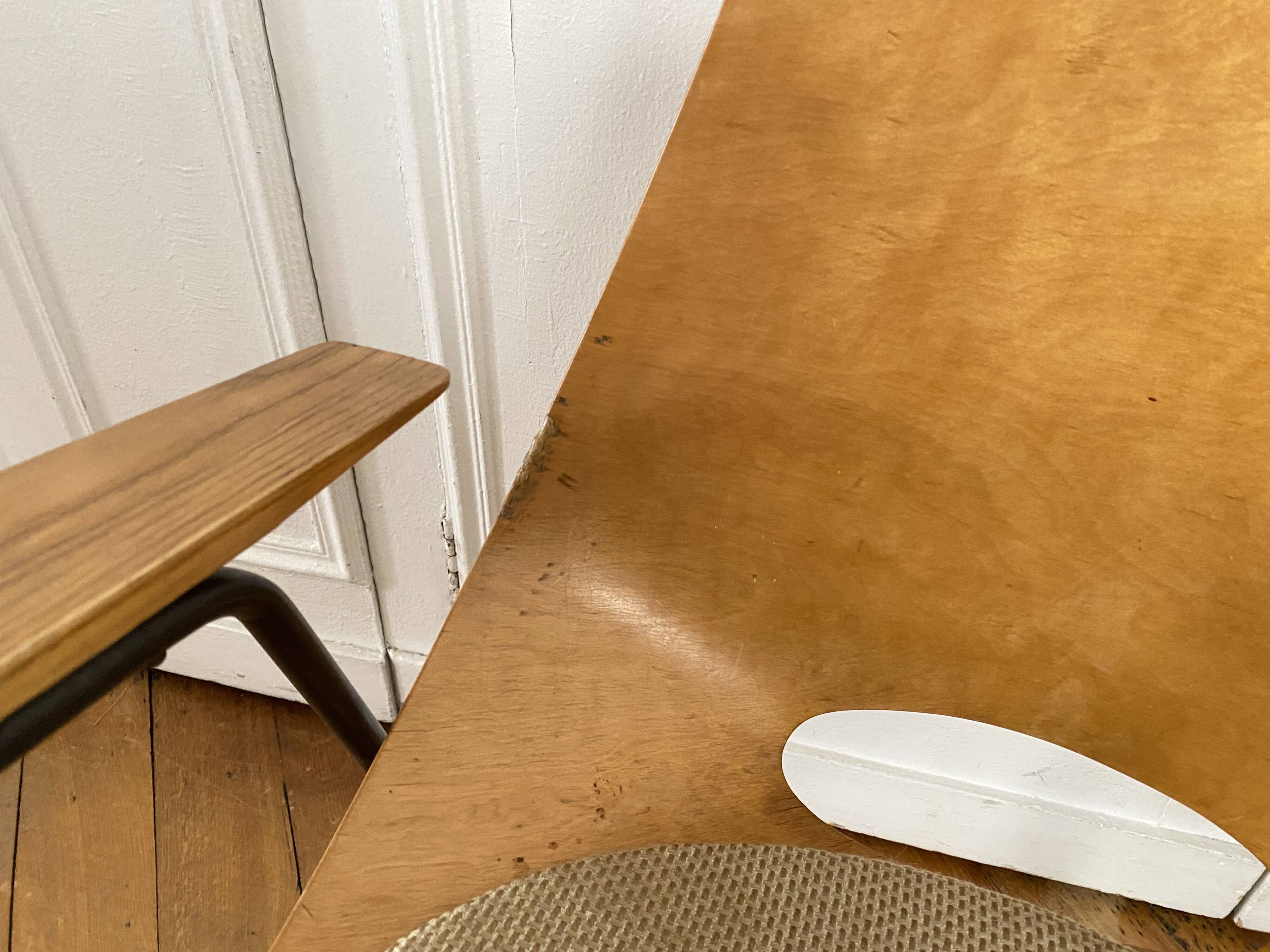 Pair of “Tonneau” armchairs by Pierre Guariche