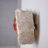 Brutalist wall lamp in concrete and glass