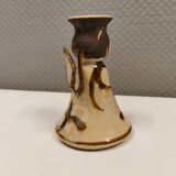 Ceramic candle holder, in the shape of an angel, signed at the bottom.