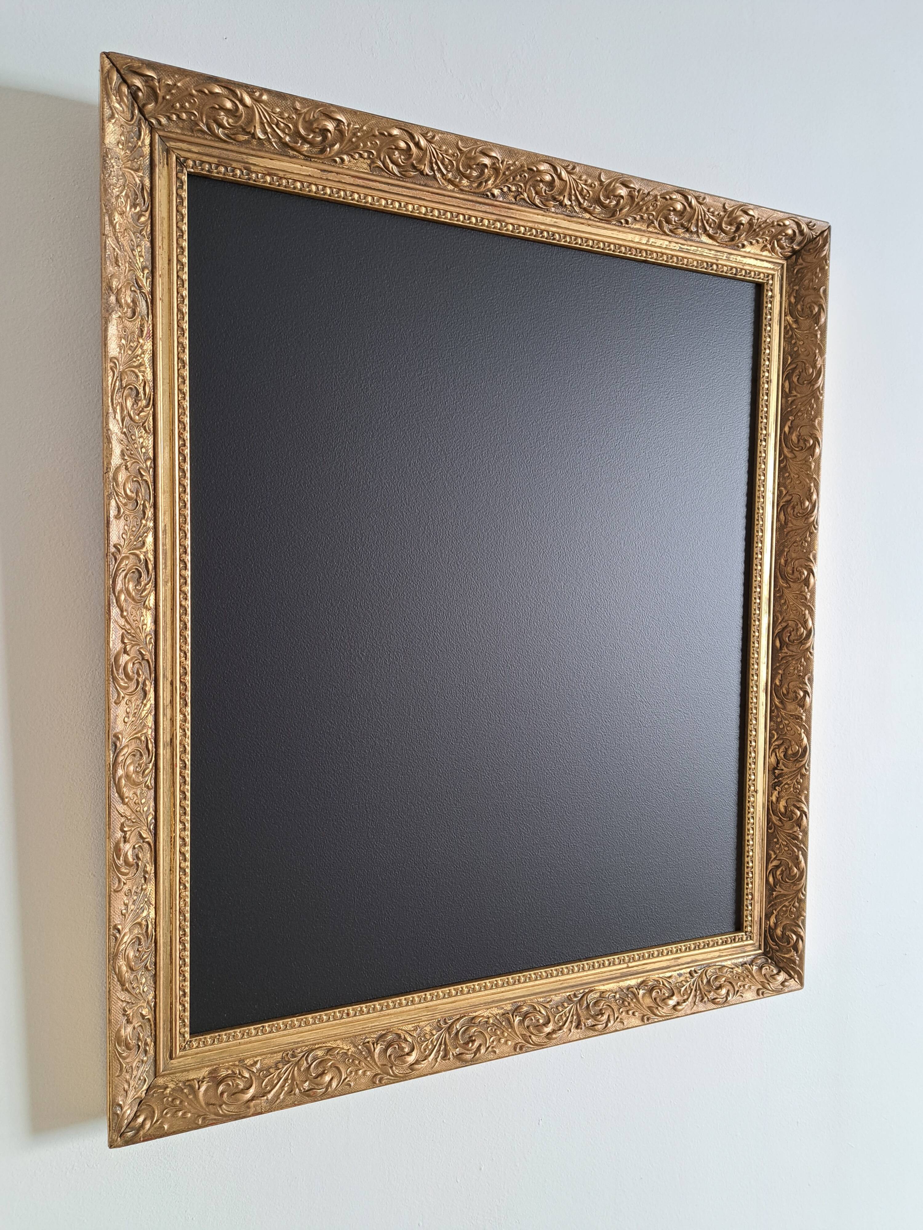 Slate table framed in gold leaf style