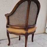 Fauteuil de bureau louis xv, sculpté, canné, garni cuir