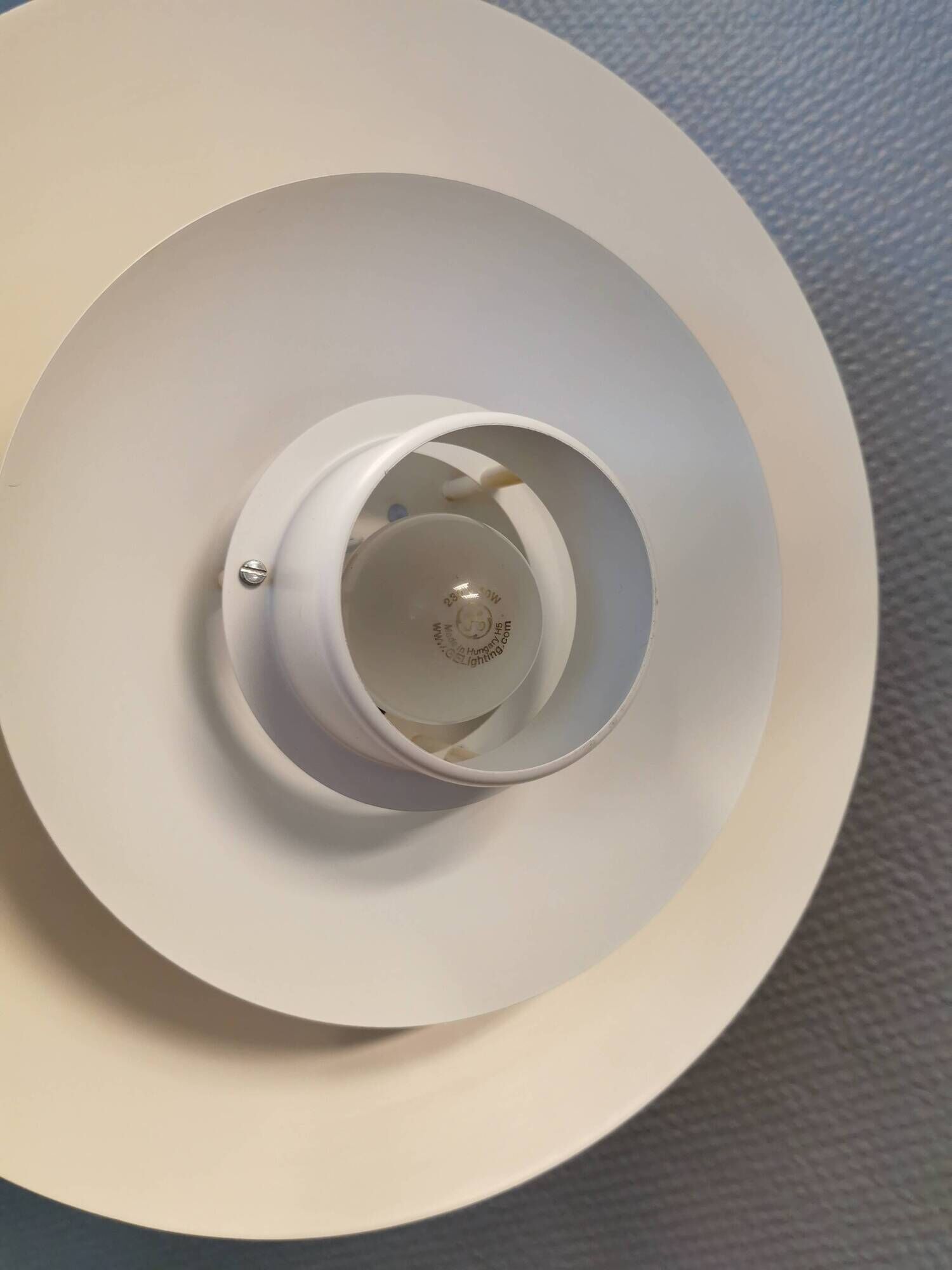 FormLight hanging lamp with multiple layers of shades, a Danish quality product from the 80s.