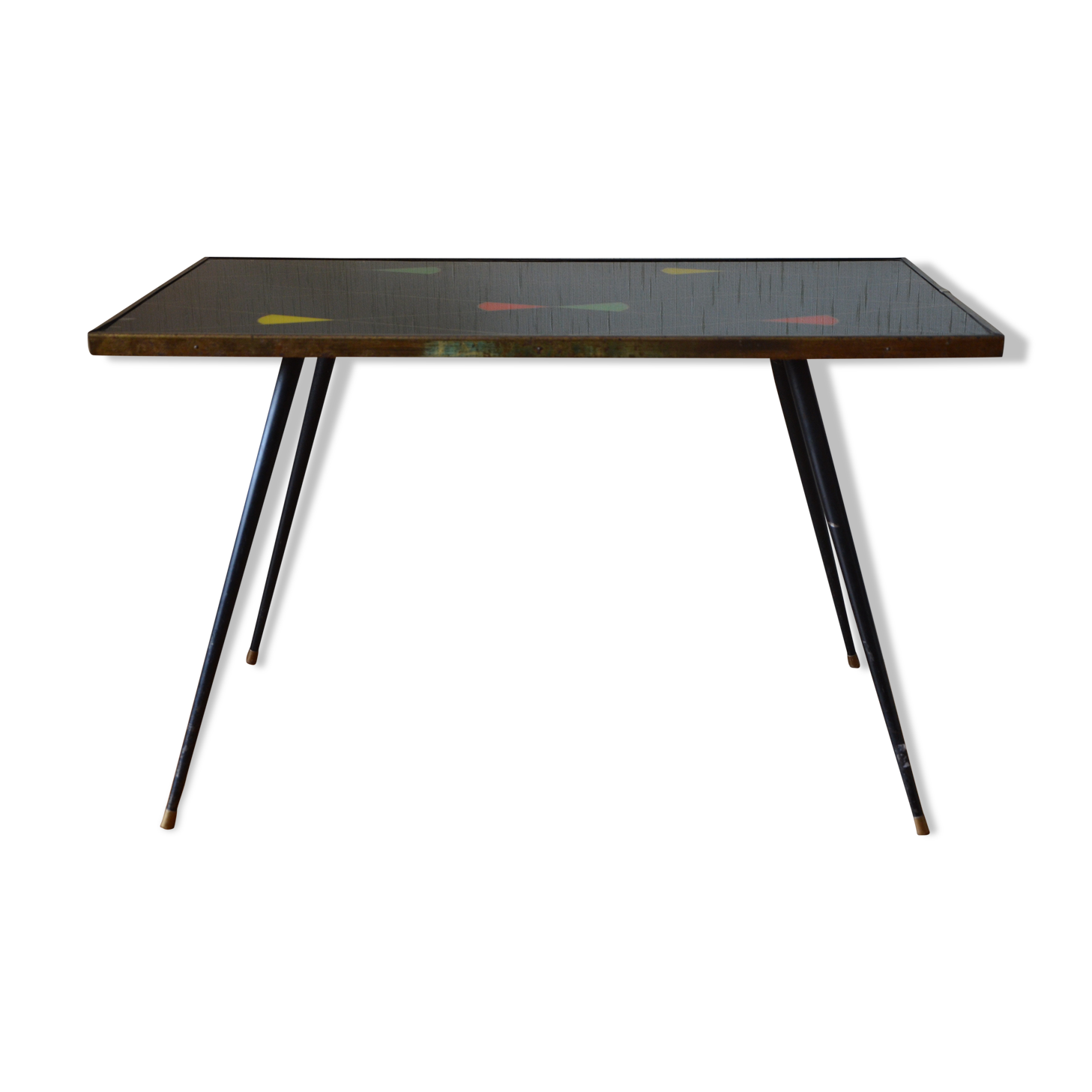 Brass and glass coffee table with compass feet