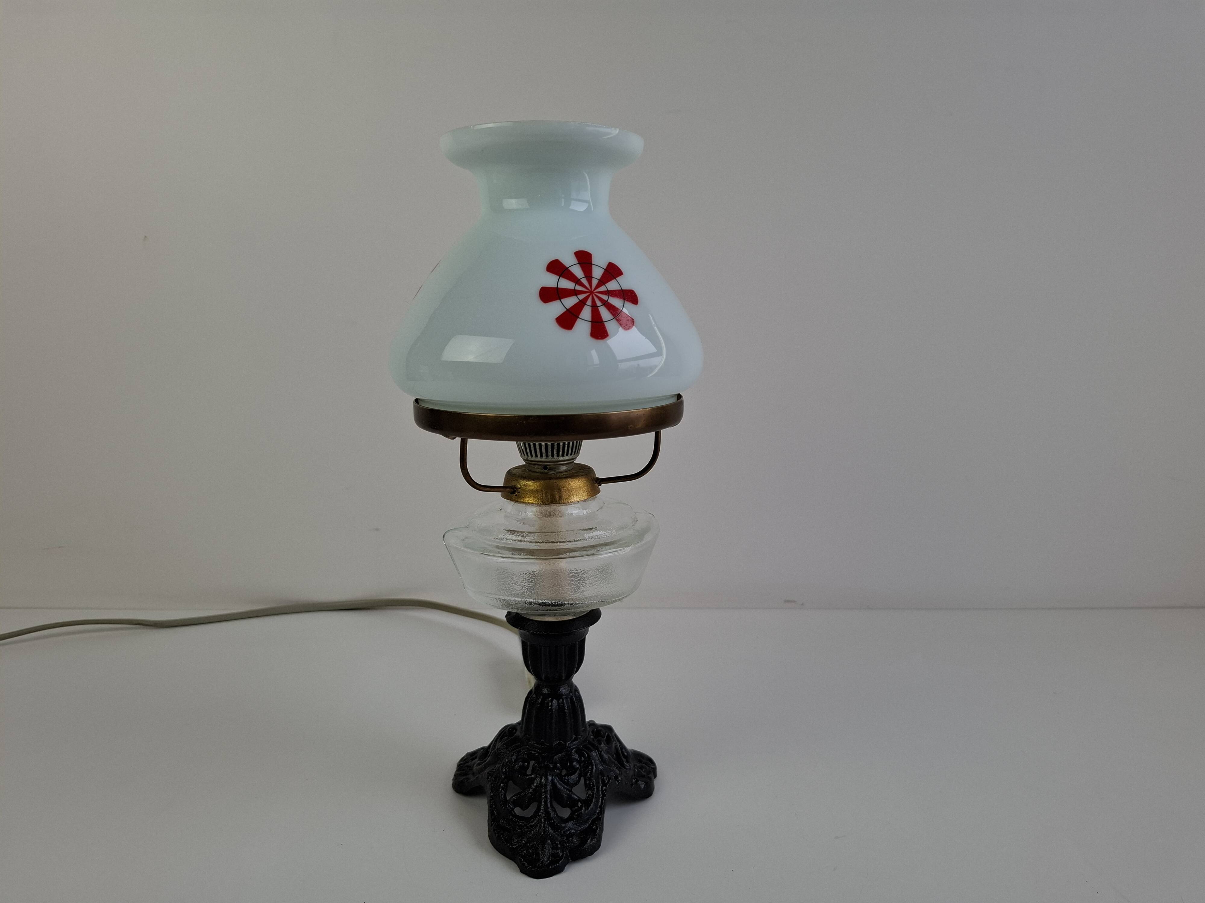 1960s Czechoslovakian milk glass oil lamp style table lamp with red windmill