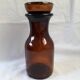 Apothecary bottle jar in amber brown glass with cap