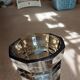 Large brown Art Deco vase with cut facets.
