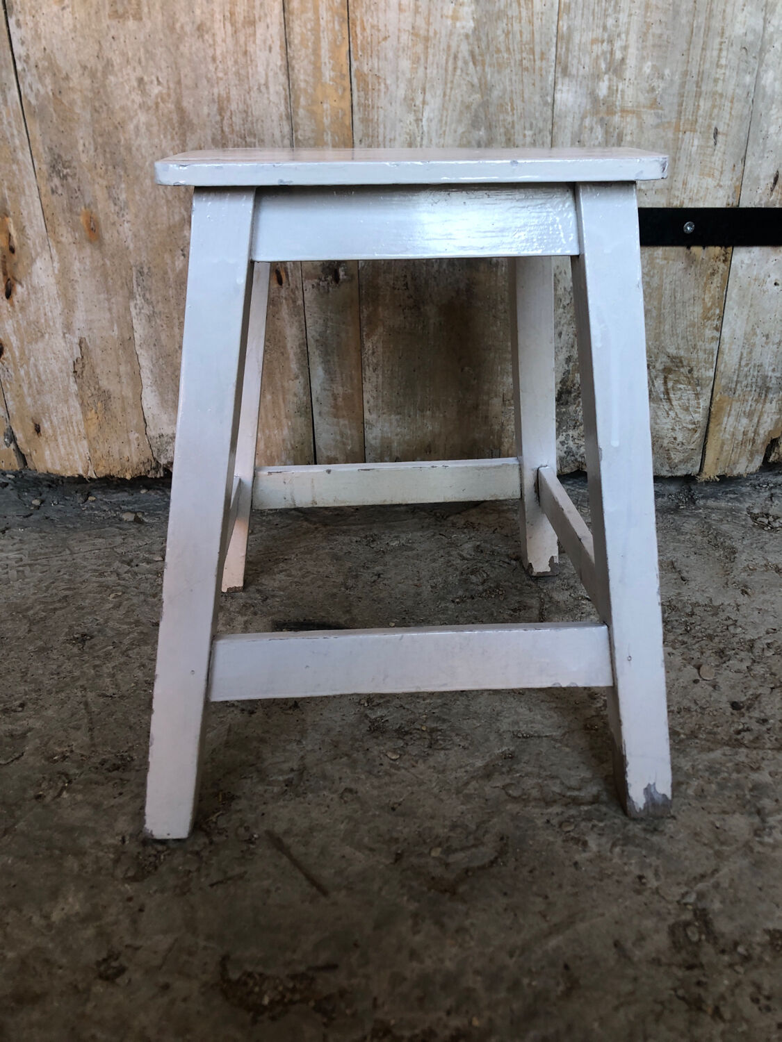 Vintage white wood milking stool