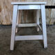 Vintage white wood milking stool