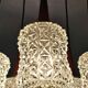 Mid Century Modern spider chandelier in teak, rosewood, and crystal.