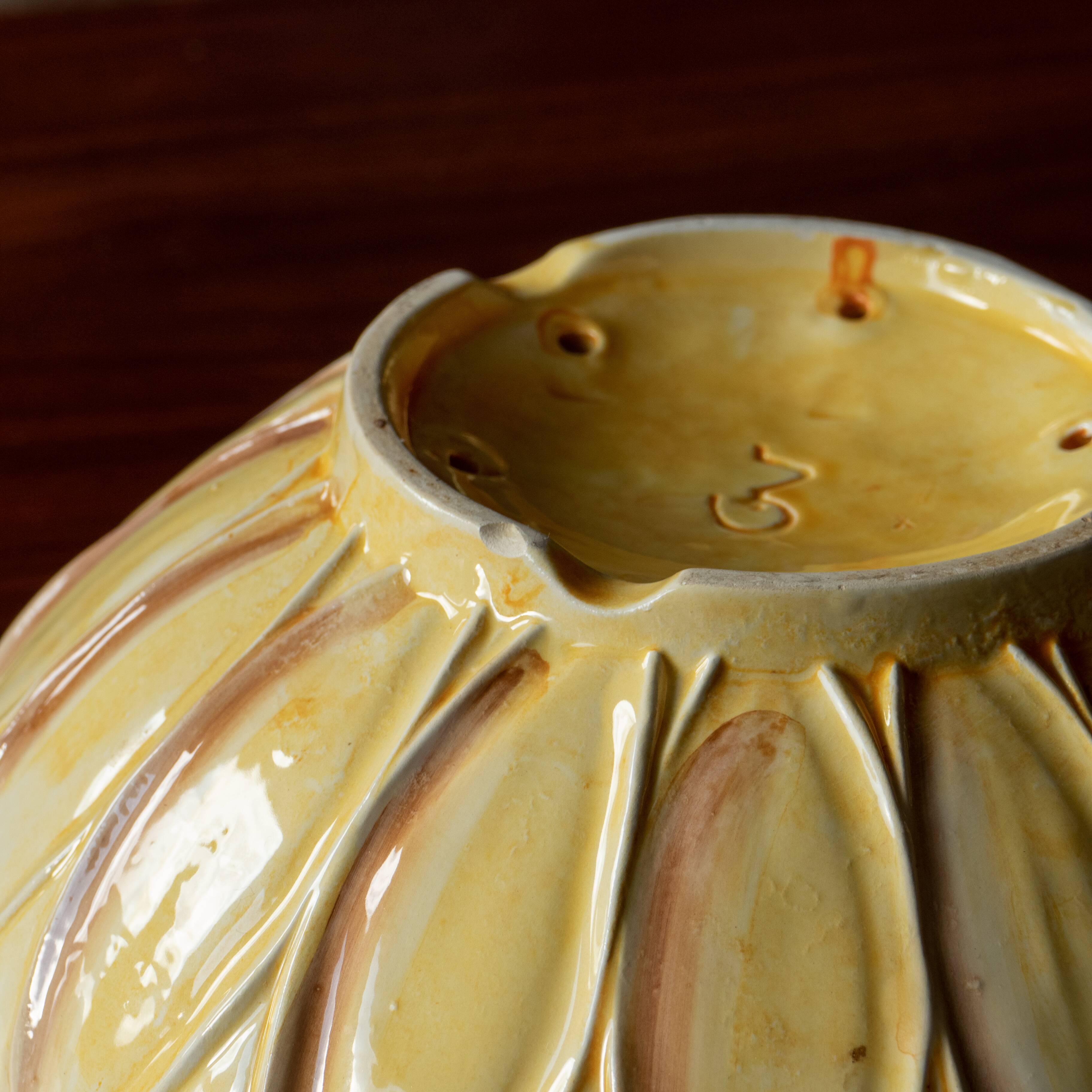 Old drainer in sunflower slip signed GV